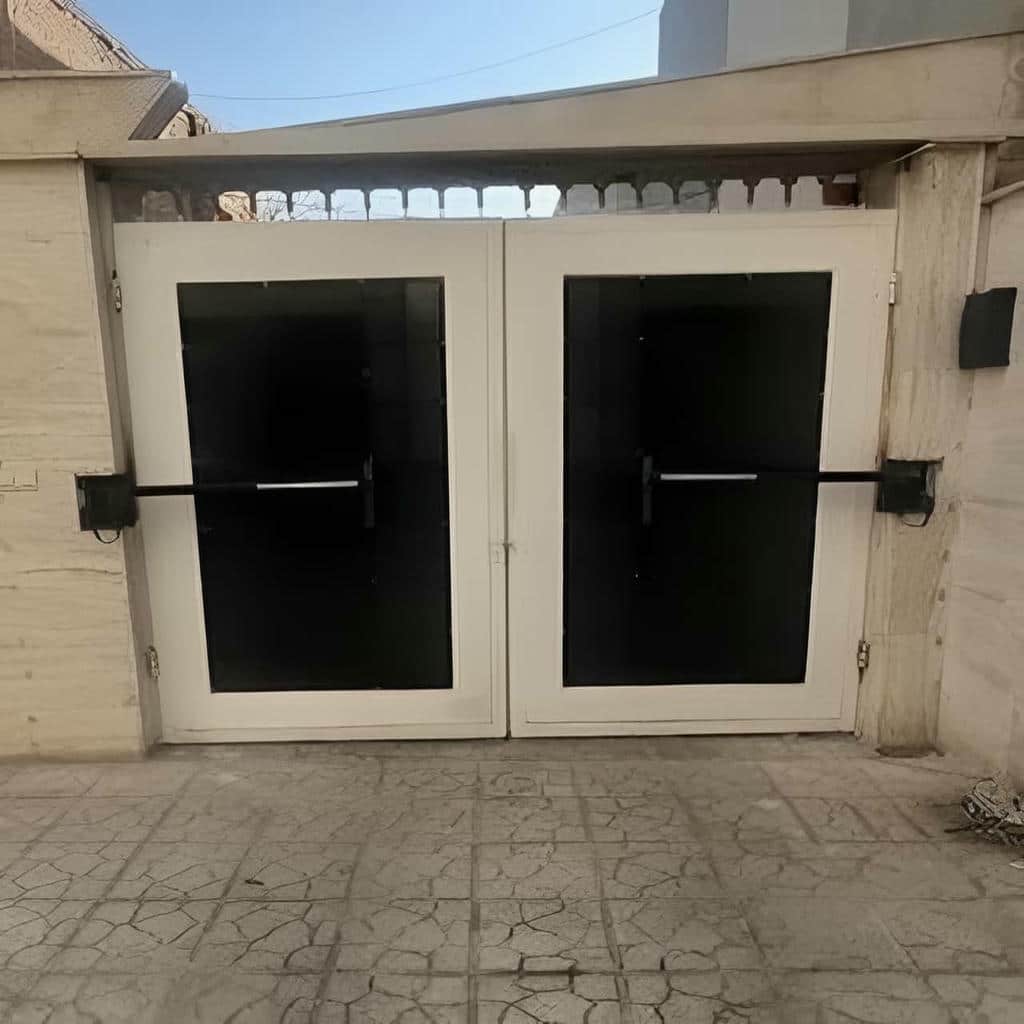 جک شفت بلند درب پارکینگ لولایی روی درب سنگین