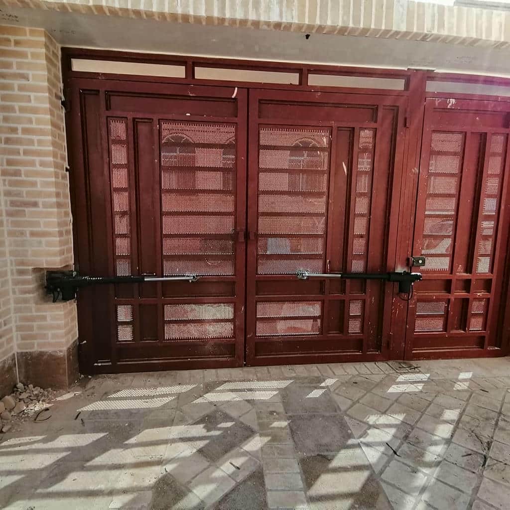ایمنی جک شفت بلند درب پارکینگ لولایی برای ورودی دو لنگه
